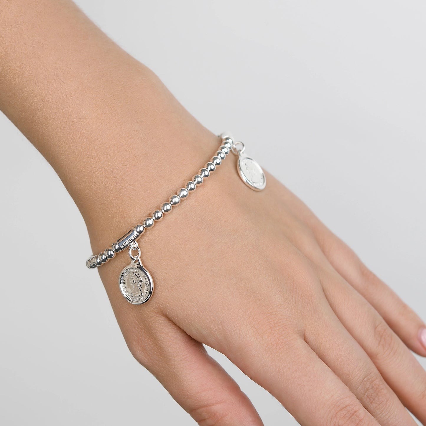 VT TRIPLE COIN STRETCH BRACELET