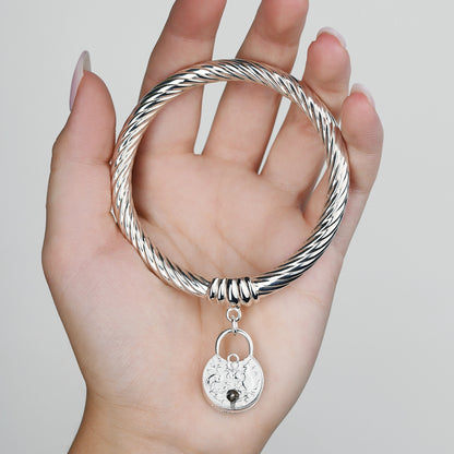 VT COIN PADLOCK TWIST BANGLE